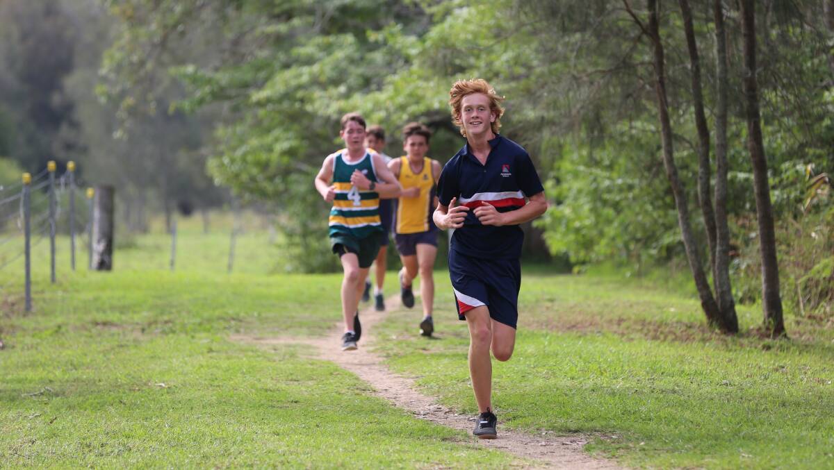 PICTURESQUE: Isaac Ashton of Avondale School competes in the Hunter Region Independent Schools Cross Country Championships on Avondale Estate’s historic walks. Picture: Colin Chuang.
