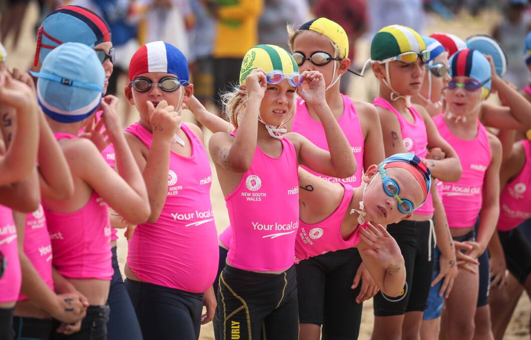 READY TO GO: Young competitors at the starting line at the NSW Junior Surf Life Saving Championships at Blacksmiths Beach last year. The event returns to Blacksmiths this weekend. Picture: Marina Neil