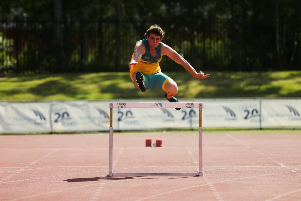 Determined: Paralympic hopeful Blake Carr trains five days a week and works as a labourer with HTS Group one day each week. He will compete in the 110 metre hurdles and discus throw next week. Picture: Jonathan Carroll