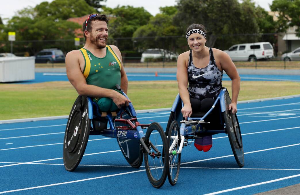 SHORTLIST: Newcastle wheelchair athletes Kurt Fearnley and Lauren Parker, together at "The Blue Track" in National Park earlier this year, have been nominated for "The Don" Award. Picture: Simone De Peak