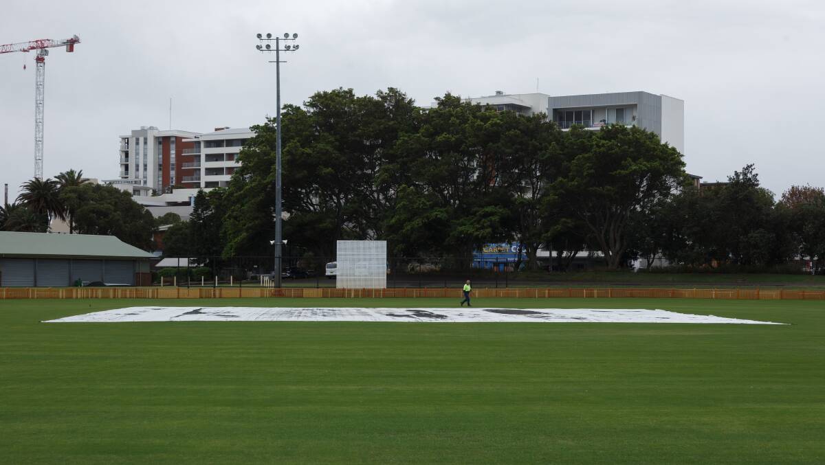 WET: The covers down at No.1 Sportsground on Wednesday. Picture: Max Mason-Hubers