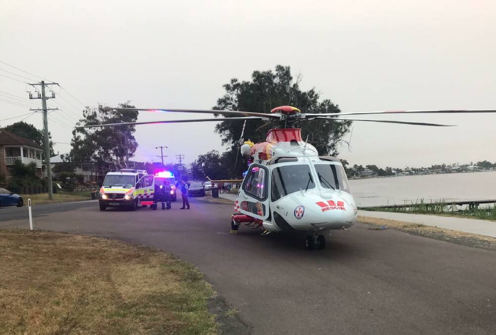 URGENT: Crews at Toukley on Sunday evening. Picture: Westpac Rescue Helicopter Service