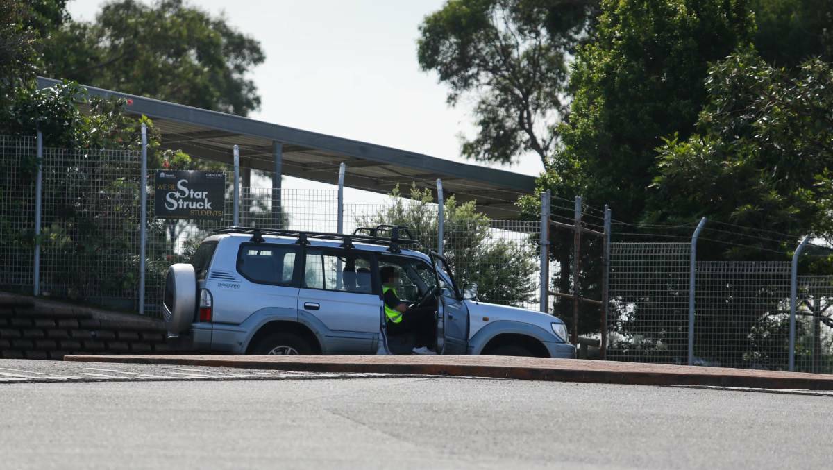 On guard: The Department of Education paid security officers to spend 10 hours each day patrolling 81 public schools - including 19 in the Hunter - during 12 days of the autumn holidays. Picture: Jonathan Carroll
