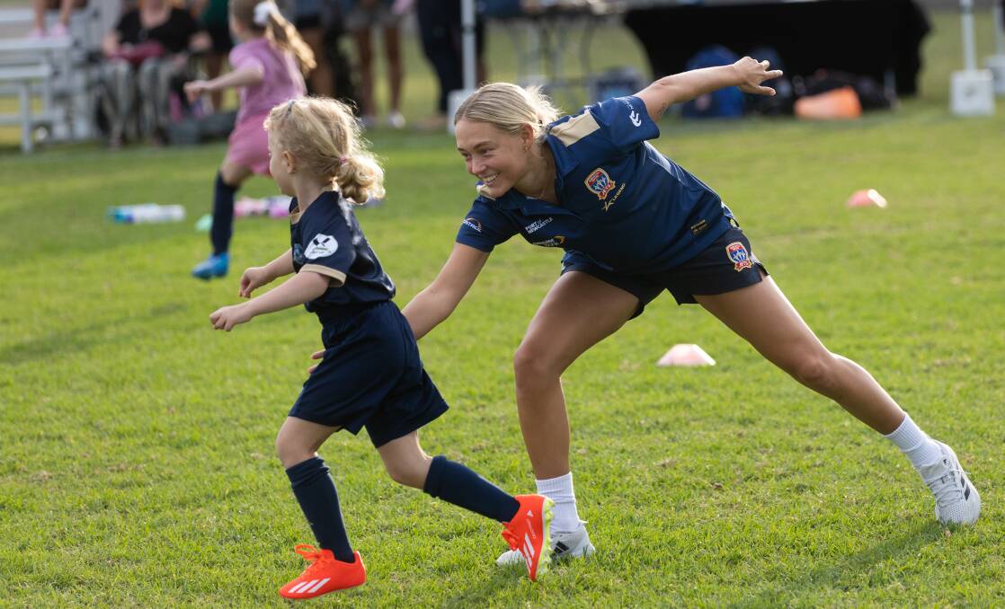 Newcastle Jets player Libby Copus-Brown gets into the action at a girls only soccer clinic at Novocastrian Park, New Lambton on Monday. Picture by Jonathan Carroll