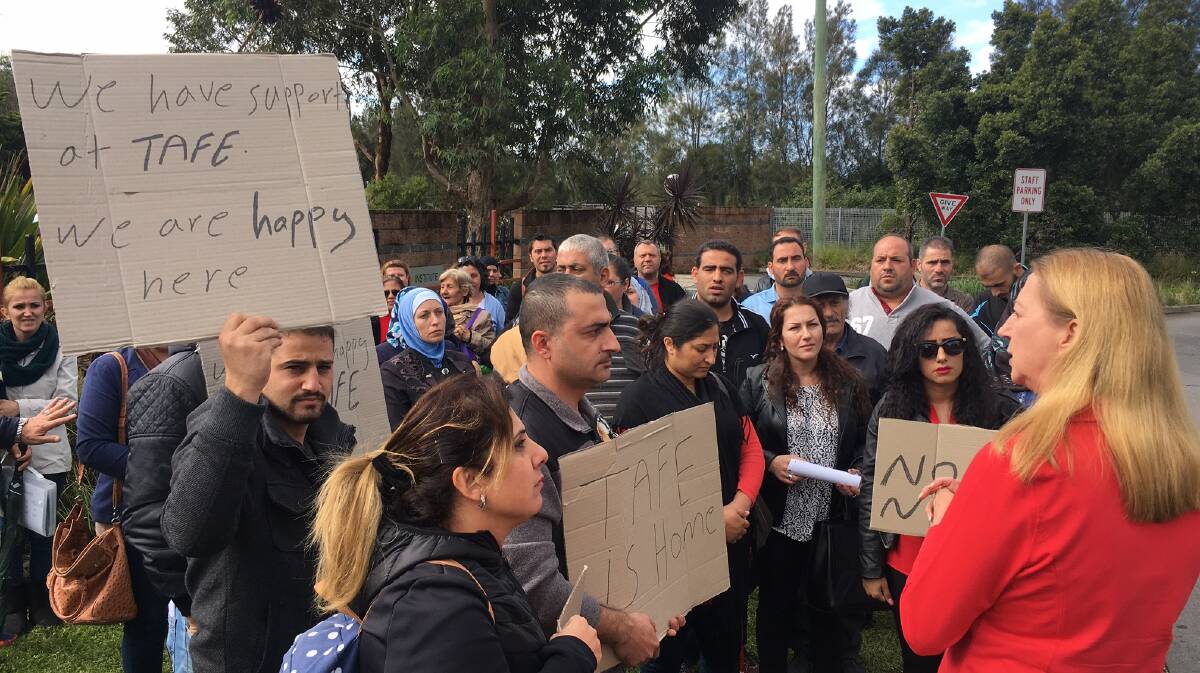 NOT HAPPY: Adult Migrant English Program (AMEP) students at TAFE Illawarra's Wollongong campus expressed their anger with the decision during a rally on May 4.