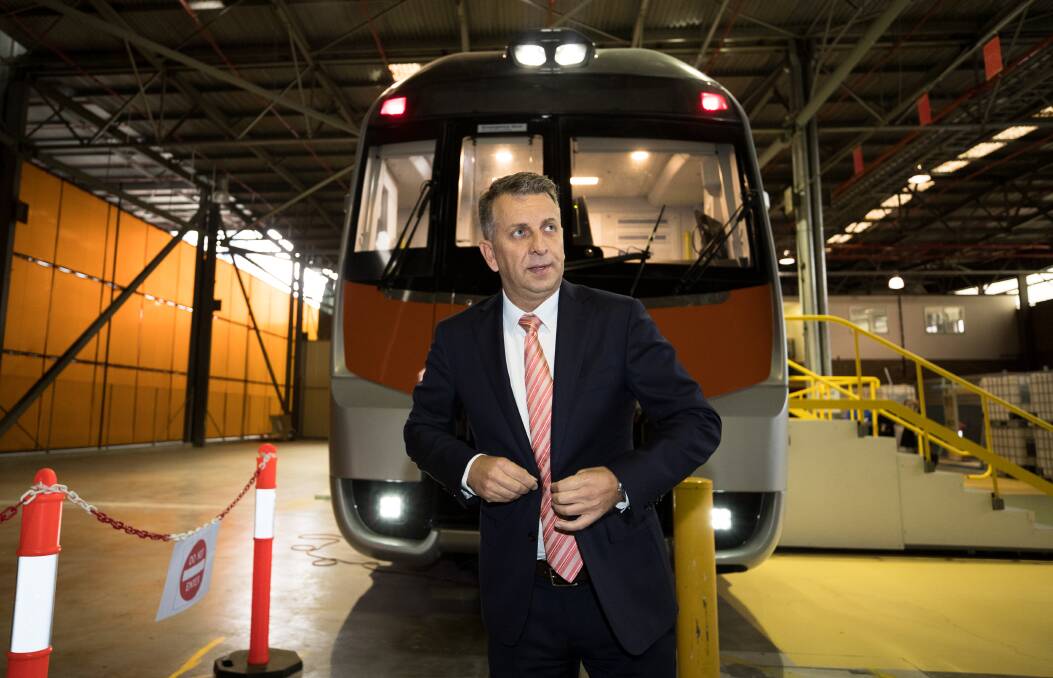 DELAYED: Transport Minister Andrew Constance inspecting a prototype of the new intercity fleet. Picture: Janie Barrett