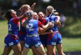 Newcastle's Tarsha Gale Cup players celebrate a try. Picture NSWRL