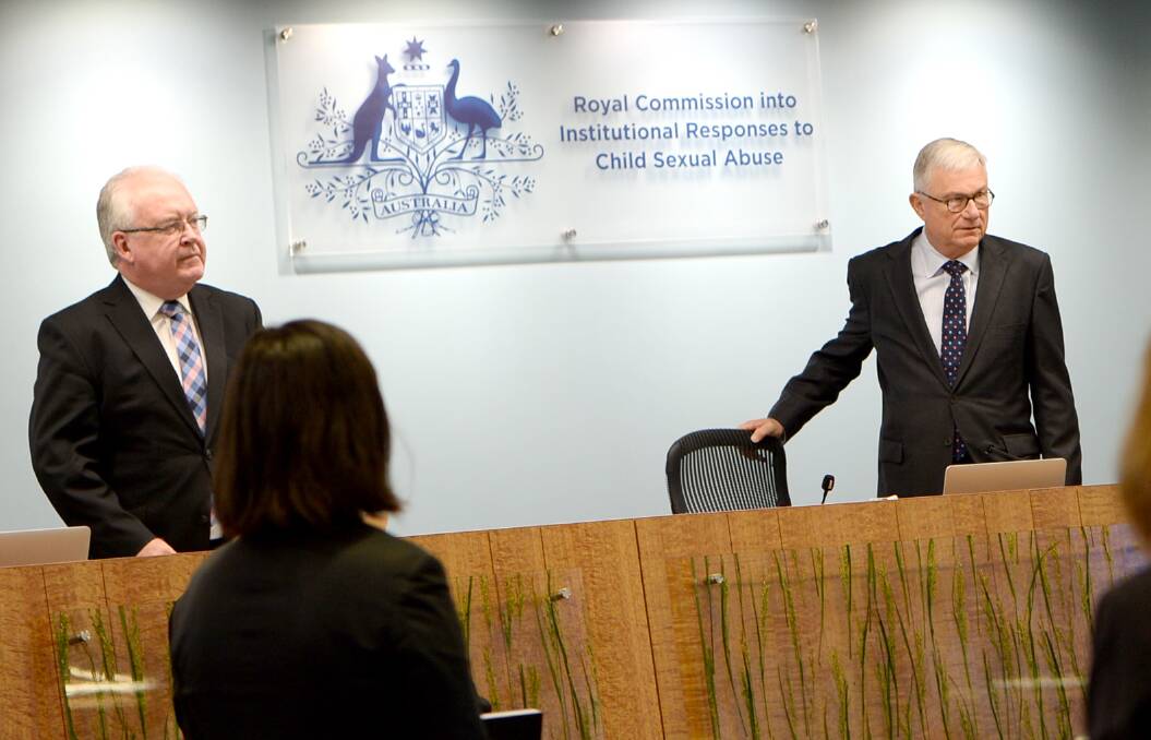 Questions: Royal Commissioner Robert Fitzgerald (left) and chair Justice Peter McClellan questioned Catholic Church clergy about the Australian church's policy on overseas priests.