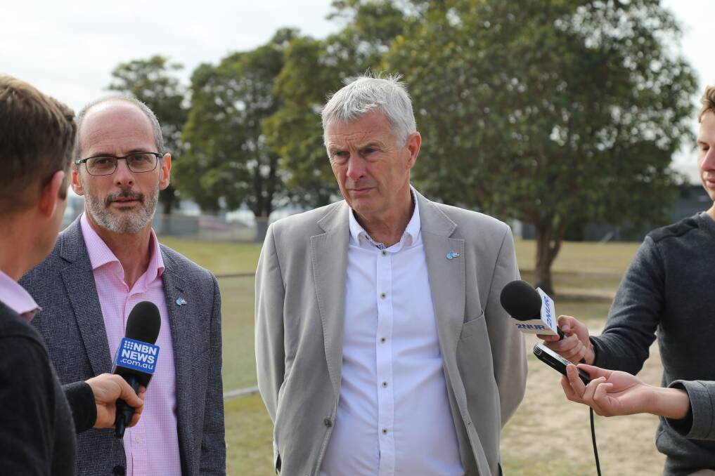 Hunter Water's executive drought lead Darren Cleary with acting CEO Graham Wood speaking to media at Grahamstown Dam on Friday, August 23. The pair announced Level One water restrictions will be in effect from September 16.