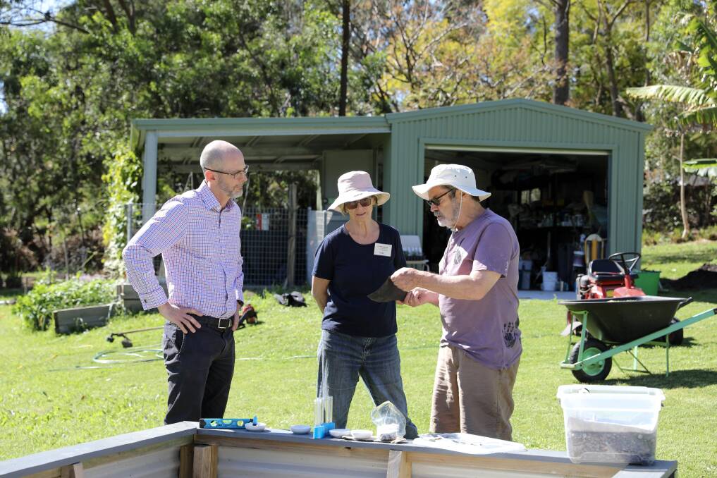 SAVE: Hunter Water managing director Darren Cleary meeting with Trudy Patterson and Peter Smith, volunteers of Warners Bay Community Garden which received a $10,000 Love Water Grant in 2019. Picture: Supplied