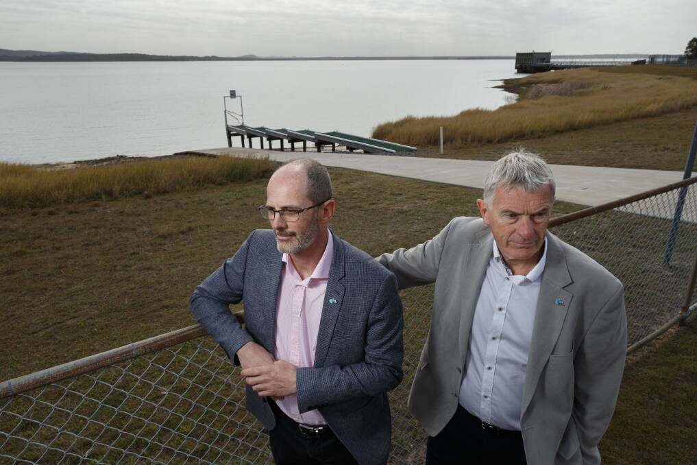 CONSERVE WATER: Hunter Water's executive drought lead Darren Cleary with acting CEO Graham Wood at Grahamstown Dam. Picture: Max Mason-Hubers