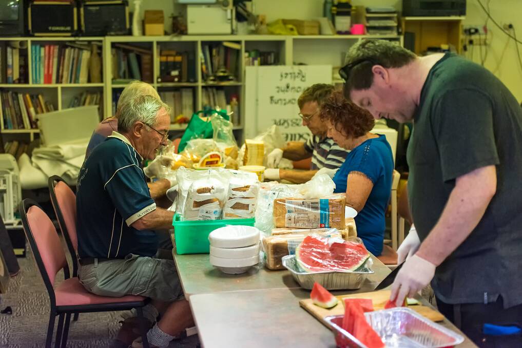 HELPING HANDS: Wangi Men's Shed preparing meals for around 100 firefighters on Thursday, January 2. The Men's Shed, Wangi Lions and the community has prepared more than 500 meals for firefighters since New Year's Day. Picture: Picture: Chris VanderSchaaf