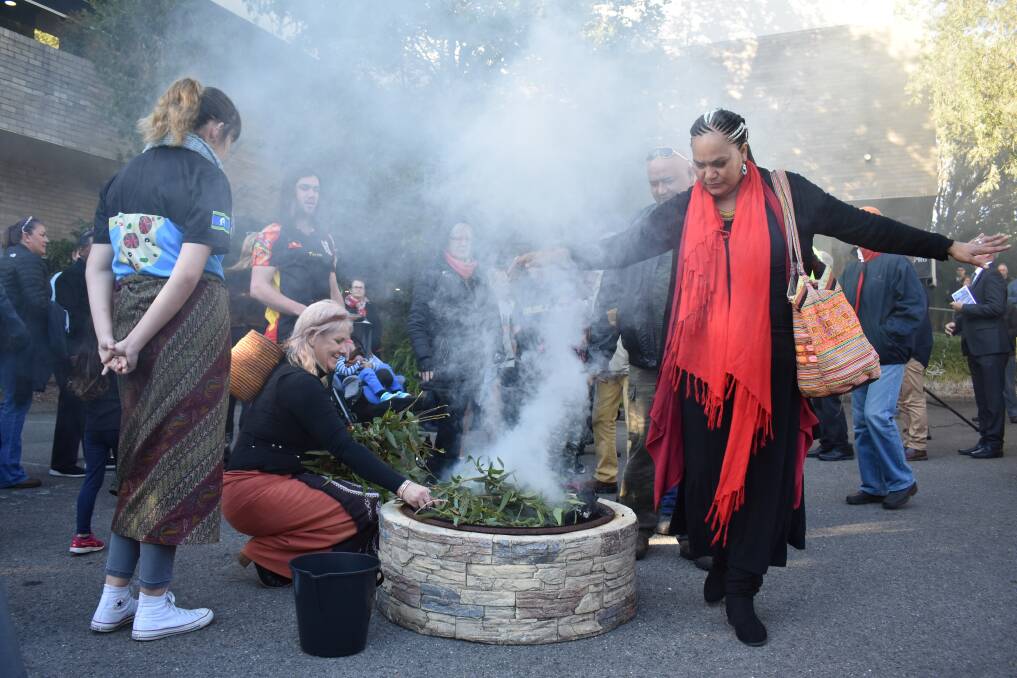 CULTURE: A smoking ceremony during the 2018 Lake Macquarie NAIDOC Week celebrations. Picture: Lake Macquarie City Council