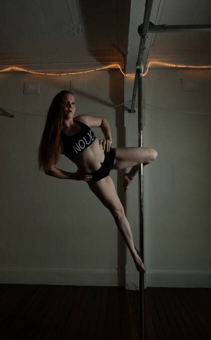 ENOUGH: Newcastle pole dancer and instructor who goes by the stage name Scarlett Lea hopes her dance highlights an important message. Picture: Simone De Peak
