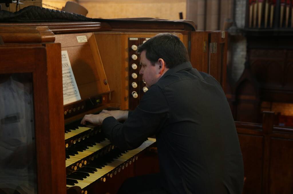 PERFORMER: Peter Guy playing the historic organ. Picture: Simone De Peak