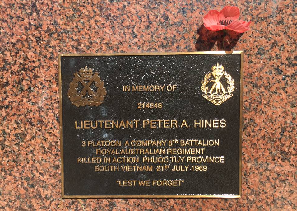 The plaque commemorating Peter Hines at the Wangi memorial. 