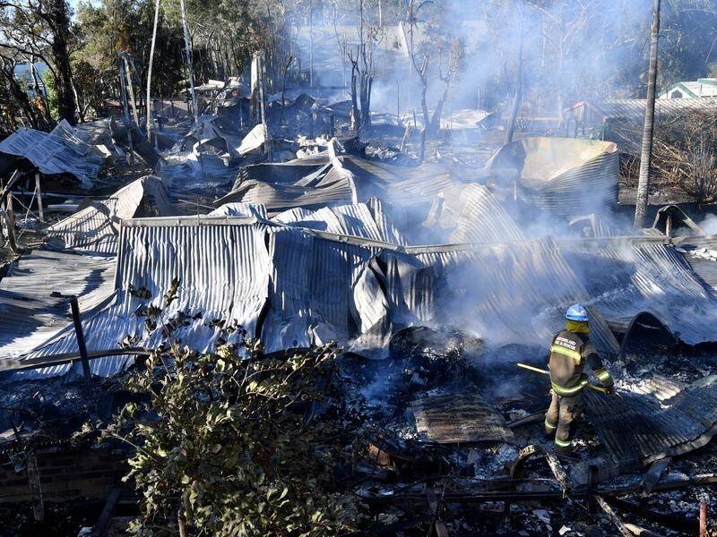 Fire is again threatening the Noosa North Shore where three homes were destroyed in 2017.