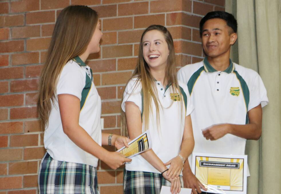 Images from the Morisset High School year 12 graduation for the class of 2015. Pictures by DAVID STEWART