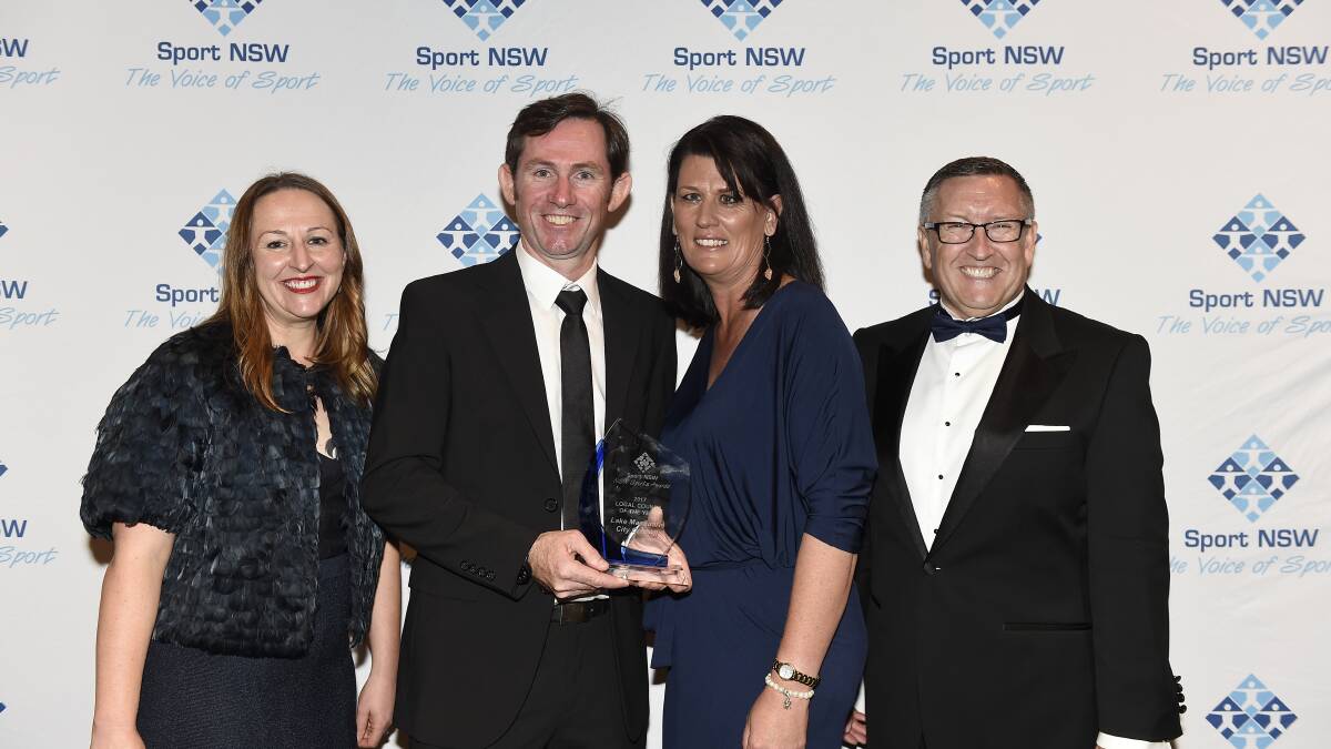 HONOURS: Steve Cowen (Community Land Planner, Sports) and Peta McGrath (Ageing & Disability Support) with Executive Director Sport Infrastructure Group Karen Jones (left) and Director of Sports NSW Peter Hugg (right).