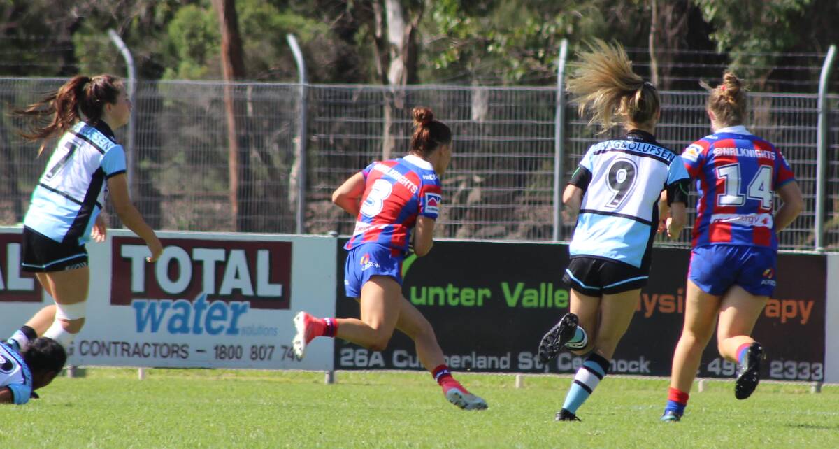 DEFEATED: Southlakes Roosters' product Shenay Ball (pictured gunning for the line) scored once for the Knights as they fell 66-18 to the dominant Cronulla Sharks in Cessnock. Picture: Isaac McIntyre