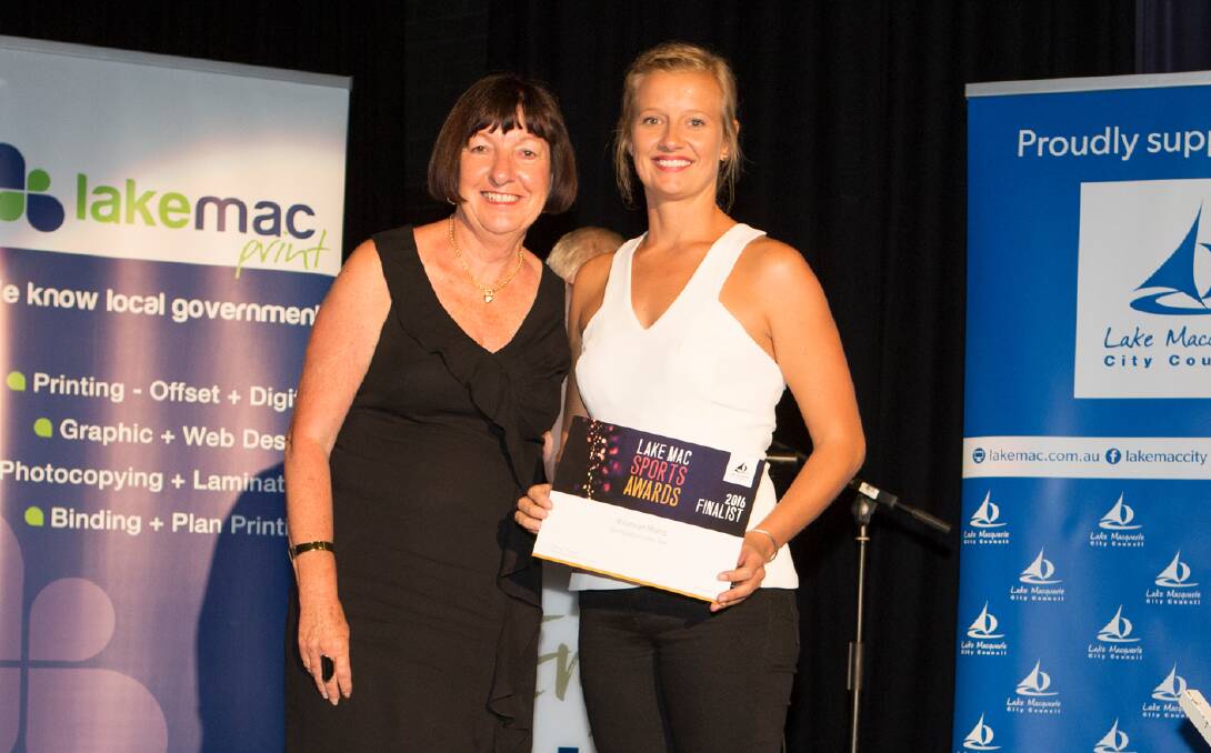 STAR: Rhiannan Iffland was named joint Lake Macquarie Sportsperson of the Year at last year’s awards, pictured with Mayor Kay Fraser.
