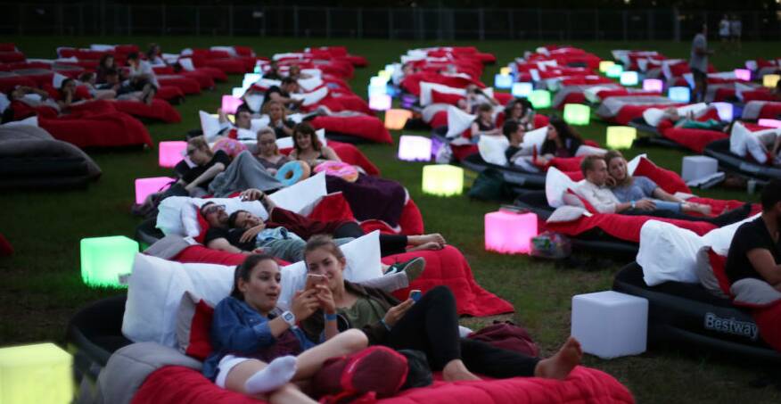 OUTDOORS: Budgewoi hosted an outdoor cinema under the stars that boasted comfy beds and glowing lights. Picture: Move'In Bed
