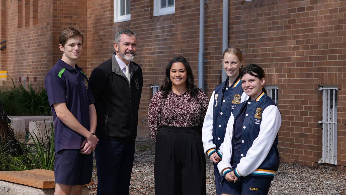 Cessnock High School principal Peter Riley and history teacher Kelsey Kisina with students Jayden Brown, Gabrielle Streitberger-Sams and Charlotte White. Picture supplied
