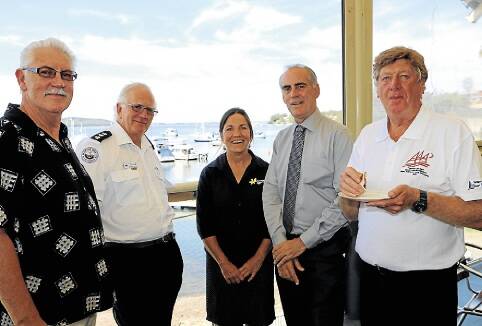 SUCCESS: Pictured at the Heaven Can Wait cheque presentation are, from left, RMYCT Commodore Graham Parr, John Hatton, Sue Russell, Greg Piper and Mel Steiner. Picture: Jamieson Murphy