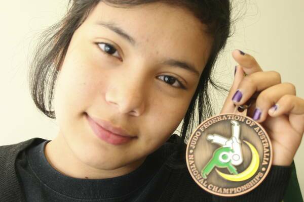 GUTSY: Angelina Yokoyama with her bronze medal. Picture: David Stewart