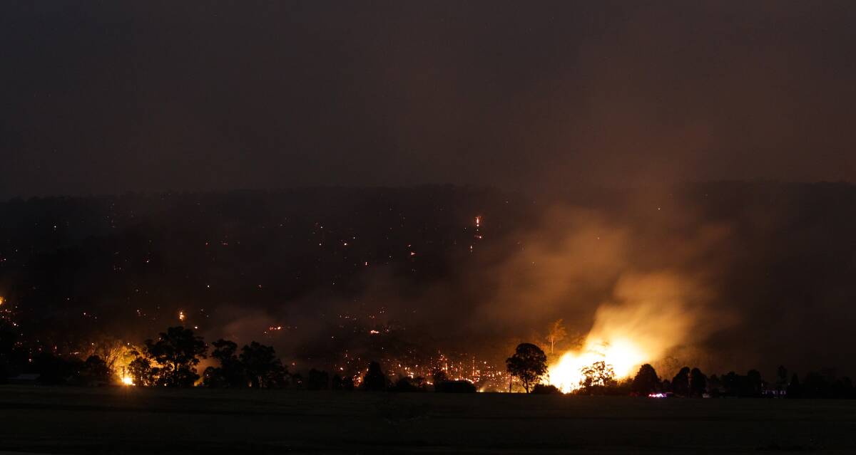 Fire crews on the ground battling several blazes at Yellow Rock near Springwood in the Blue Mountains. Photo: DALLAS KILPONEN